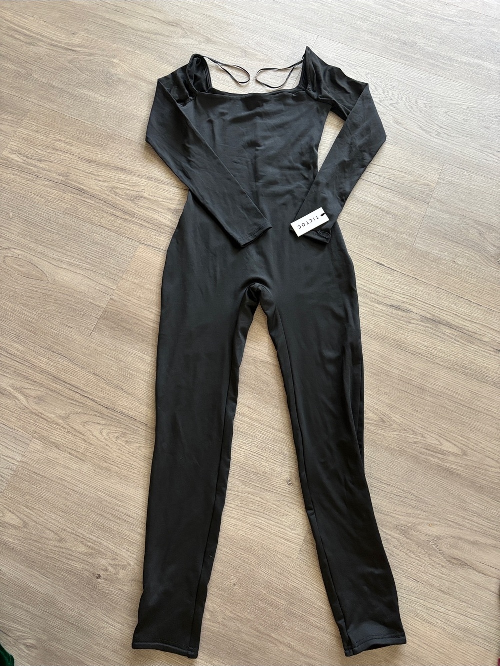 Fitted Black Long-Sleeve Square-Neck Jumpsuit
